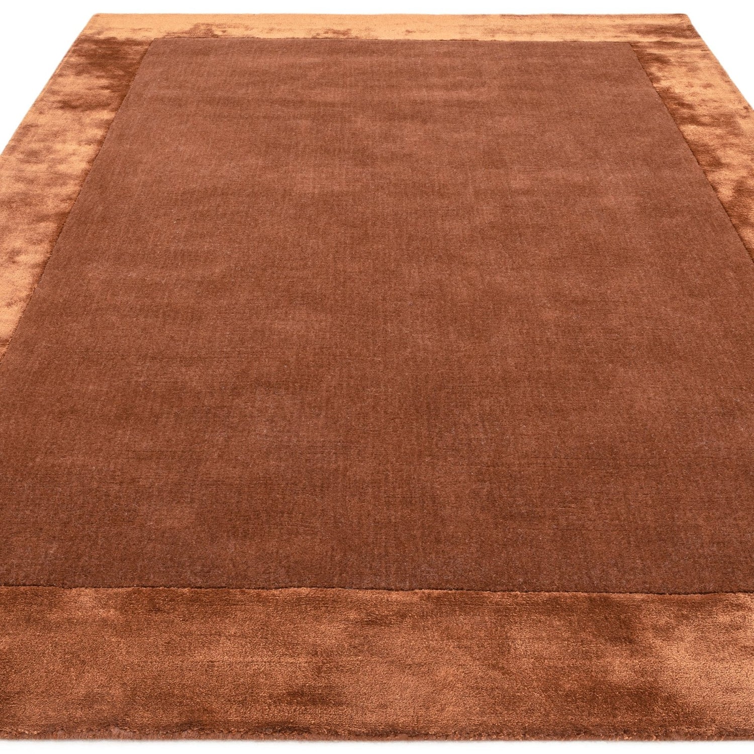 "Beige hand tufted carpet with elegant border design and soft plush texture."