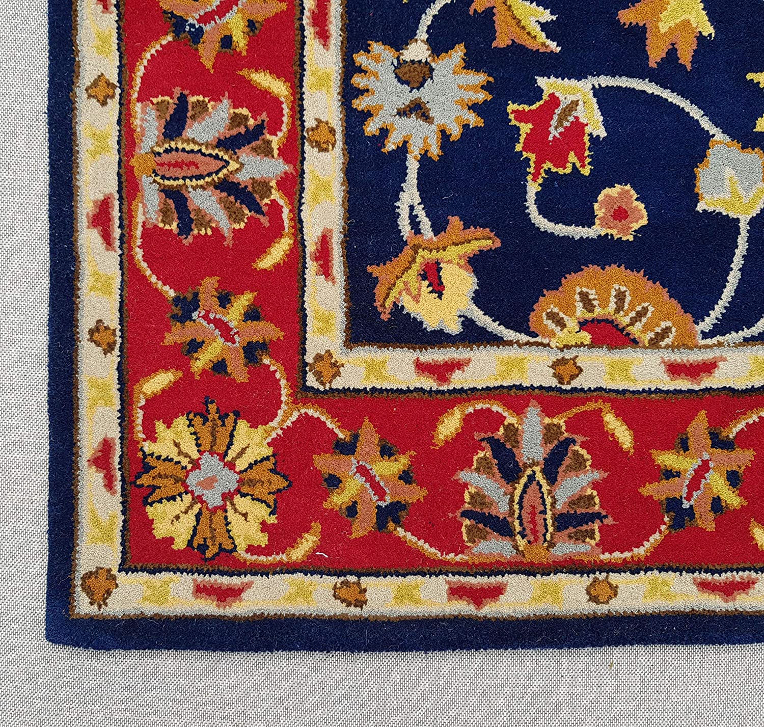 P7.3 hand tufted carpet with elegant border design and soft plush texture