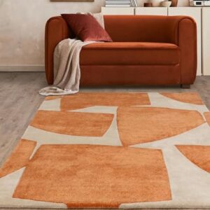 hand tufted carpet with elegant border design and soft plush texture."