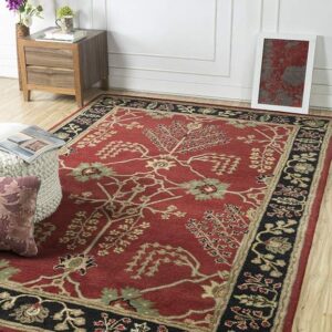 hand tufted carpet with elegant border design and soft plush texture."