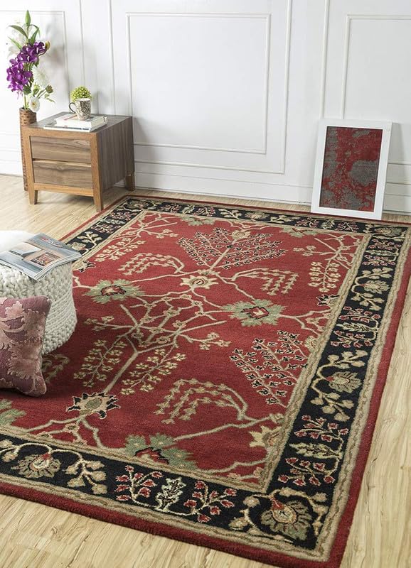 hand tufted carpet with elegant border design and soft plush texture."