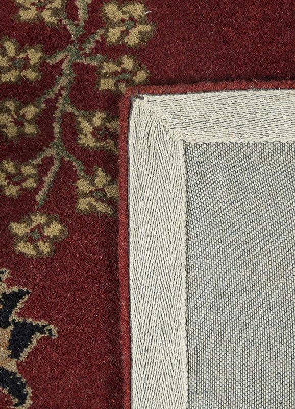 Tufted 42.4 hand tufted carpet with elegant border design and soft plush texture."