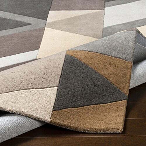 Tufted 5.3 hand tufted carpet with elegant border design and soft plush texture."