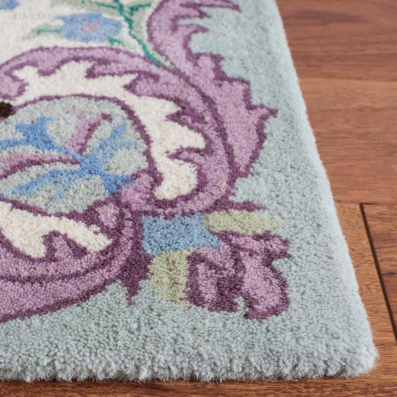 Tufted 6.3 hand tufted carpet with elegant border design and soft plush texture."