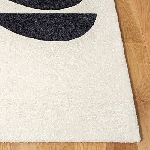 Tufted 9.6 hand tufted carpet with elegant border design and soft plush texture.